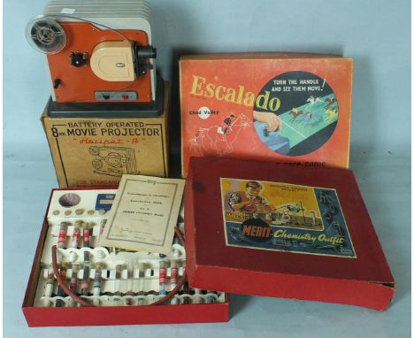 A battery powered 8mm Magic Projector "Hokipet-A", boxed, a Chad Valley Escalado set, boxed, and a Merit Chemistry Outfit, bo