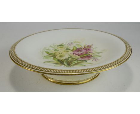 Circular Ceramic Tazza, With Hand Painted Floral Decoration To Centre on White Back, and Gilt Trim. Diameter 9.5 inches.
