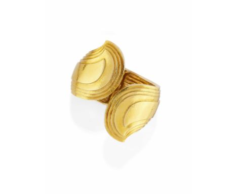 A' motif géometriquePoinçon 18KPoids total 134,00g environA GOLD BANGLE, SIGNED WEBB