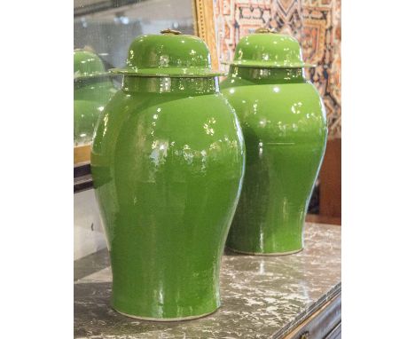 VASES, a pair, Chinese ceramic leaf green jar form with lids, 59cm H. (2)