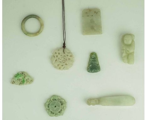 A CHINESE WHITE JADE BELT HOOK, 19th century five various jade pendants, 19th/20th century jade man (with faults), a jade rin