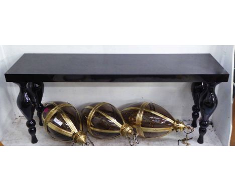 LONG CONSOLE TABLE, black lacquer on bulbous legs, 200cm x 50cm x 89cm H.