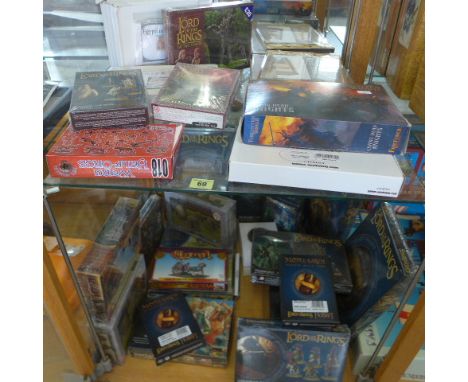 A good collection of Games Workshop Lord of the Rings boxed figure sets and buildings, also other buildings and sets - please