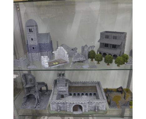 A collection of plastic and other Lord of the Rings and other Wargaming buildings and ruins and five trees 