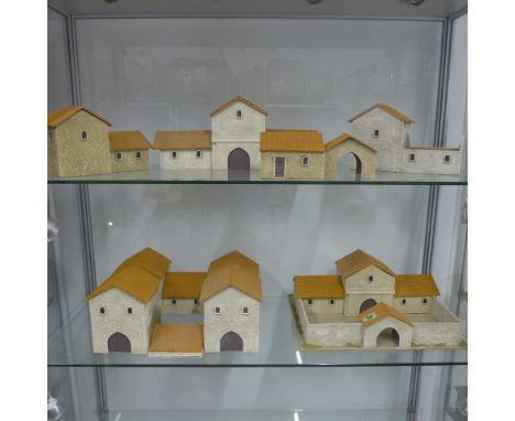 Wargaming - a collection of buildings with orange tile roofs, one roof missing 
