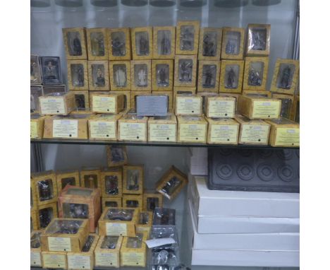 A collection of 116 New Line Cinema Lord of the Rings painted figures and three others - all boxed, with display stands 