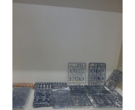 A collection of Perry minifigures Lord of the Rings plastic spruces and others - please see images for vendors listing 