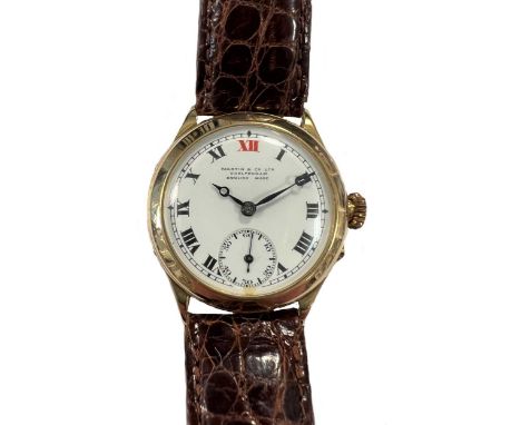 Unsigned, retailed by Martin &amp; Company, Cheltenham - An 18ct gold wristwatch, circa 1929, the retailer signed circular wh