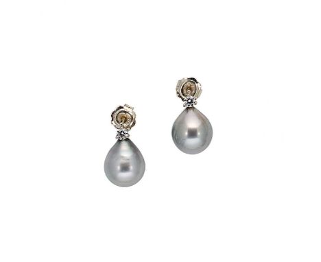 A pair of Tahitian pearl and diamond set ear studs, each with a pear shaped Tahitian cultured pearl, approximately 13.5 x 11m