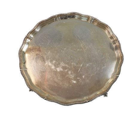 A George VI silver salver, mark of Thomas Bradbury &amp; Son Ltd., London 1938, 'Chippendale' style with gadrooned rim, the f