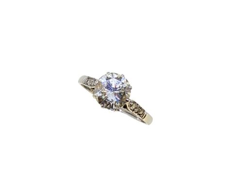 An early 20th century single stone diamond ring, claw set transitional brilliant cut diamond, approximate diameter 7.40 x 7.2