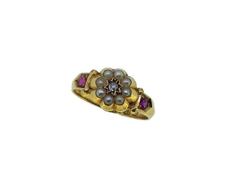 A Victorian 18ct gold diamond, split pearl and ruby cluster ring, central old brilliant cut diamond, surrounded by eight spli