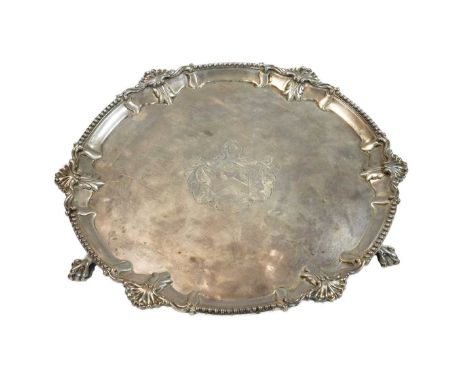 A George III silver salver, mark of John Edwards III, London 1809, 'Chippendale' style with shell and bead rim, the field eng
