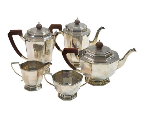 A George VI silver five-piece tea and coffee set, mark of Mappin &amp; Webb, Sheffield 1946, the teapot of octagonal panelled