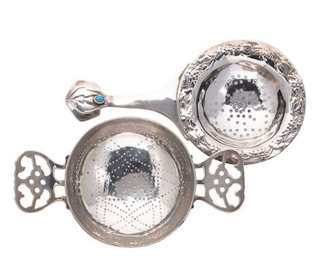 Two early 20th century silver tea strainers, first, with mark of Florence Stern, Birmingham 1907, circular dished bowl with s