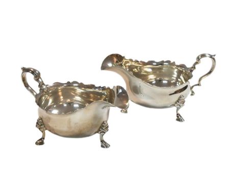 A pair of George VI silver sauce boats, mark of Adie Brothers, Birmingham 1937, each of traditional form, with cut edged rim 