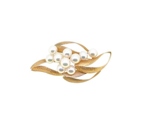 A pearl brooch, ten cultured pearls, diameter from 7.2 to 7.7mm, four pierced curved sections with a textured and matt finish