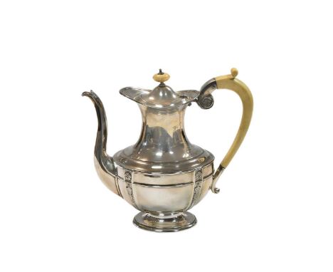 An Edward VII silver coffee pot, mark of James Dixon & Sons Ltd., Sheffield 1905, of oval form, lower with four decorative ve