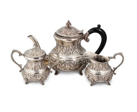 An Indian metalwares 3-piece tea set, stamped SILVER, no further apparent marks, circa 1900, the teapot of circular waisted f