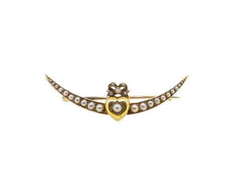 A split pearl crescent brooch, central heart with a split pearl, surmounted by a split pearl bow, and mounted to a crescent s