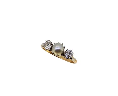 A pearl and diamond three stone ring, central 6mm cultured pearl, flanked by two old mine cut diamonds, estimated approximate