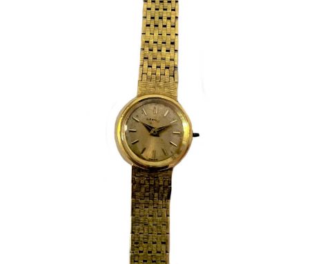 Unsigned, retailed by Garrard &amp; Co. - An 18ct gold wristwatch, circa 1969, the signed circular champagne dial, 14mm diame