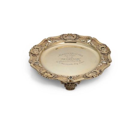 A (possibly) George III silver gilt presentation dish from a Royal collection, marks almost completely obliterated by engravi