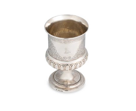 A George III silver goblet, mark of Solomon Hougham, London 1818, of campana form, lower gadrooned, upper engraved with scrol