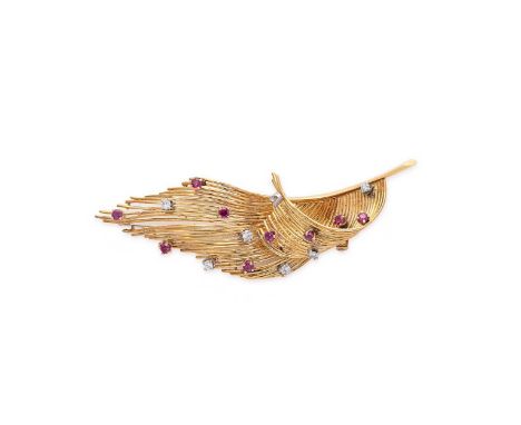 Tiffany &amp; Co. - A ruby and diamond feather brooch, realistically modelled as a feather set with seven scattered claw set 