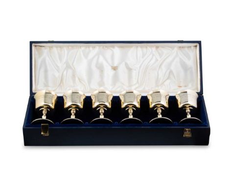 A cased set of six Elizabeth II silver gilt goblets, mark of William Comyns & Sons Ltd. (Richard Comyns), London 1966, displa