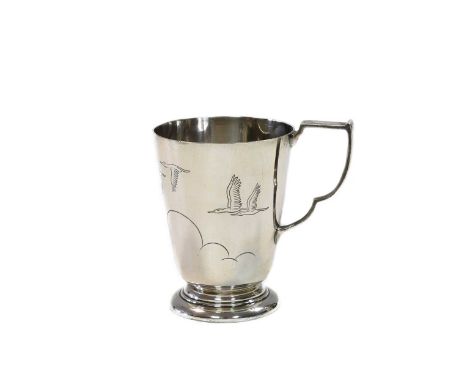 A George VI silver christening mug, mark of Wakely &amp; Wheeler, London 1948, of tapering form, the sides decorated with eng