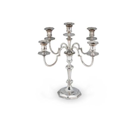 An Edward VII silver metamorphic 5 light candelabra,  mark of Hawksworth, Eyre &amp; Co. Ltd., Sheffield 1906, the filled hex