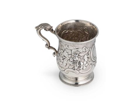 Dublin - An 18th century silver mug, mark of Michael Homer (1771-1784), other marks almost indecipherable, of traditional bal