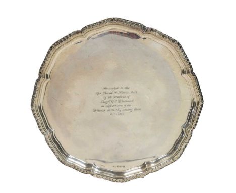 A George VI silver salver, mark of Viner's Ltd., (Emile Viner), Sheffield 1940, 'Chippendale' style with gadrooned rim, the f