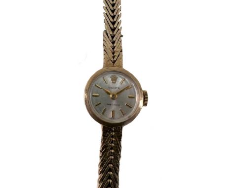 Rolex - A 9ct gold 'Precision' wristwatch, circa 1966, the signed circular silvered dial, 12mm diameter, with gold coloured b