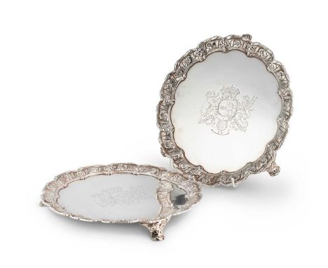 A pair of George III 18th century silver waiters, mark of Richard Rugg, London 1760, each with decorative cast foliate rim, t