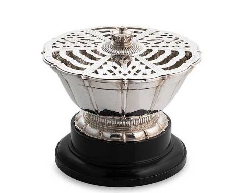 A George VI silver rose bowl and stand, mark of Carrington &amp; Co., London 1950, of circular fluted form with panelled side