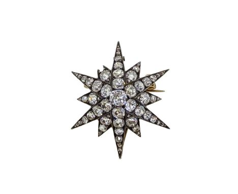 A Victorian diamond star brooch, twelve pointed star with a central old mine cut diamond, approximately 4.9 x 4.8mm, estimate