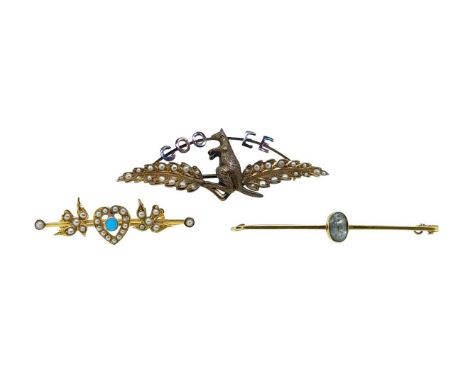 A trio of brooches, first, the Australian COO-EE kangaroo brooch set with split pearls, length 5.7cm, unhallmarked, stamped '