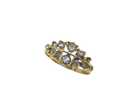 A Victorian diamond ring, pierced foliate design set with eleven rose, old brilliant and round brilliant cut diamonds (one la