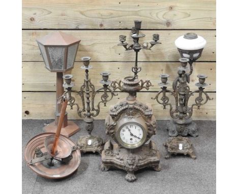 A 19th century three piece clock garniture, 43cm high, together with a continental figural oil lamp base, a hexagonal copper 