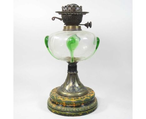 An Art Nouveau oil lamp base, the glass reservoir with teardrop applied decoration, 36cm high