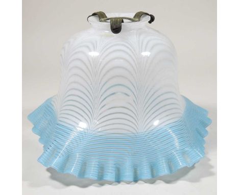 A glass oil lamp shade, of frilled shape, with blue and white swirled decoration, 15cm highCondition report: 6cm aperture. Sl