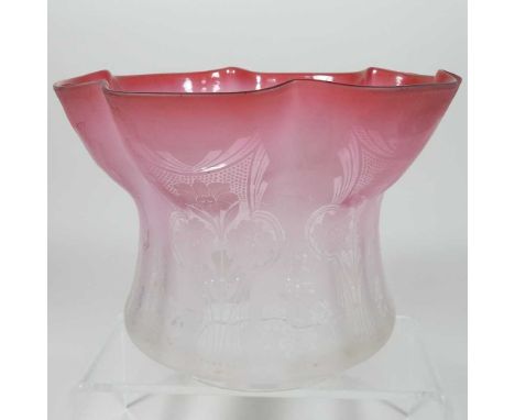 A red glass oil lamp shade, of frilled shape, etched with floral designs, 15cmCondition report: 10cm aperture. Dirty with lig