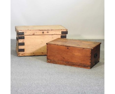An antique pine trunk, 82cm, together with another smaller (2)