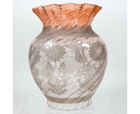 A glass oil lamp shade, having a coloured frilled rim, etched with flowers, 21cm highCondition report: 10cm aperture. Appears