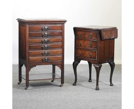 An Edwardian mahogany music cabinet, 51cm, containing a collection of music books and sheet music, together with a 1930's dro