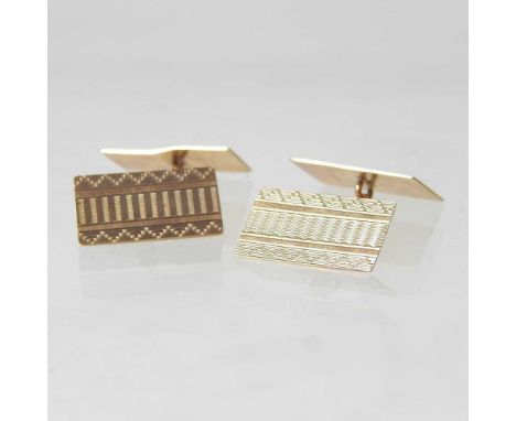 A pair of 9 carat gold cufflinks, of rectangular shape, with engine turned decoration, 3.5g (2)