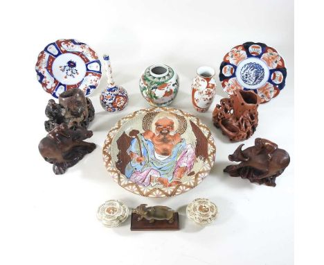 A Japanese Imari vase, together with other oriental items, soapstone carvings and a rosewood caddyCondition report: The pair 