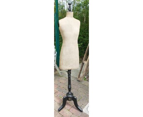 Early 20th Century Dressmaker's dummy: on a turned wooden stand with tripod stamped Stockman Paris, 166cm high 